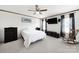 Main bedroom featuring neutral carpeting, ceiling fan, natural light, and ample space at 1981 Line Rd, Lancaster, SC 29720