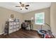 Bedroom with ceiling fan, a desk, and ample space at 1990 Country Club Dr, Lancaster, SC 29720