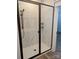 Glass enclosed shower with marble style tile and a black trim at 2084 Fordhill St, Rock Hill, SC 29732