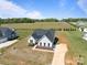 Aerial view of a well-maintained home, showcasing the surrounding greenery and neighborhood at 210 Goldenrod Cir, Salisbury, NC 28147