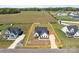 Aerial view of home with large lawn and home site outlined at 210 Goldenrod Cir, Salisbury, NC 28147