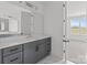 Bathroom boasts double vanity, marble floors, and bright windows at 210 Goldenrod Cir, Salisbury, NC 28147