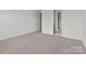 Spacious bedroom features a walk-in closet and an ensuite bathroom at 210 Goldenrod Cir, Salisbury, NC 28147