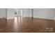 Hallway with hardwood floors and natural light at 210 Goldenrod Cir, Salisbury, NC 28147