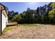 A serene backyard with a small deck and plenty of room for outdoor activities at 240 Doster Rd, Lancaster, SC 29720