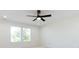 This bedroom boasts a ceiling fan, bright, natural light, and neutral carpet at 240 Doster Rd, Lancaster, SC 29720