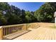 A spacious wooden deck overlooks a green, lush backyard, perfect for outdoor gatherings at 240 Doster Rd, Lancaster, SC 29720