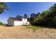 The home's exterior features a nice deck, a well maintained yard and a charming feel at 240 Doster Rd, Lancaster, SC 29720