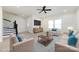 Staged living room with hardwood floors, natural light, and modern furniture and fixtures at 240 Doster Rd, Lancaster, SC 29720