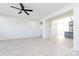 Open-concept living room that opens to a kitchen with hardwood floors and white walls at 240 Doster Rd, Lancaster, SC 29720