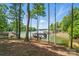 Scenic backyard offering peaceful water views, complete with a gazebo and convenient dock access at 2501 Mt Isle Harbor Dr, Charlotte, NC 28214