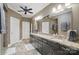 Bathroom featuring double vanities, granite countertops, and modern fixtures at 2501 Mt Isle Harbor Dr, Charlotte, NC 28214