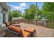 Inviting deck with outdoor seating, offering scenic views of the surrounding landscape and waterfront at 2501 Mt Isle Harbor Dr, Charlotte, NC 28214