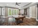 Well-appointed game room featuring a classic pool table and seamless access to outdoor entertainment spaces at 2501 Mt Isle Harbor Dr, Charlotte, NC 28214