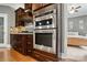 Gourmet kitchen showcases stainless steel appliances and custom cabinetry at 2501 Mt Isle Harbor Dr, Charlotte, NC 28214