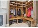 Mudroom with built in shelving, coat hooks, and shoe racks for optimized organization and convenience at 2501 Mt Isle Harbor Dr, Charlotte, NC 28214