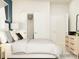 Cozy bedroom with a large bed, soft lighting, minimalist decor, and ample closet space at 2806 Morning Song Way, Lancaster, SC 29720