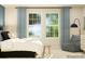 Bright bedroom with large windows, comfortable bedding, and a modern design at 2806 Morning Song Way, Lancaster, SC 29720