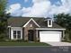 Charming home featuring stone accents, a two-car garage, and manicured lawn at 2806 Morning Song Way, Lancaster, SC 29720