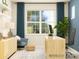 Bright office space with natural light, comfortable seating, stylish decor and calming blue walls at 2806 Morning Song Way, Lancaster, SC 29720