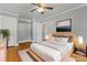 Cozy bedroom with a modern bed, hardwood floors, and ample natural light at 288 Fink Nw Ave, Concord, NC 28025