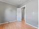 This bedroom features luxury vinyl floors, neutral paint, and a ceiling fan at 288 Fink Nw Ave, Concord, NC 28025