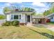 Cozy one-story home with black door security and a convenient carport at 288 Fink Nw Ave, Concord, NC 28025