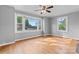Bright and airy room with hardwood floors, neutral walls and large windows at 288 Fink Nw Ave, Concord, NC 28025