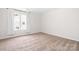 Cozy bedroom featuring natural light, plush carpet, and neutral walls at 3906 Thomas Ridge Dr, Charlotte, NC 28269