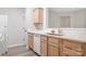 Kitchen featuring white countertops, ample cabinet space, and modern fixtures at 3906 Thomas Ridge Dr, Charlotte, NC 28269