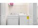 Laundry room equipped with washer and dryer, offering convenience and functionality at 3906 Thomas Ridge Dr, Charlotte, NC 28269