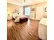 Cozy bedroom with hardwood floors, neutral walls, and a window for natural light at 4223 Willow View Ct, Matthews, NC 28105