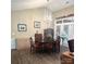 Formal dining area with a chandelier, ample natural light, and laminate flooring at 4223 Willow View Ct, Matthews, NC 28105
