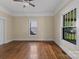 Bedroom featuring hardwood floors, neutral paint and natural light at 510 S Carolina Ave, Spencer, NC 28159