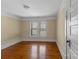 Bedroom featuring hardwood floors, neutral paint, and natural light at 510 S Carolina Ave, Spencer, NC 28159