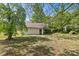 View of the backyard with a shed at 510 S Carolina Ave, Spencer, NC 28159