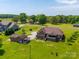 Spacious property featuring a main house, detached garage, and expansive green lawn at 514 Clover Leaf Rd, Marshville, NC 28103