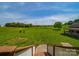 Expansive backyard with lush greenery and scenic views from the deck at 514 Clover Leaf Rd, Marshville, NC 28103