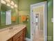 Bathroom featuring a vanity with marble countertop and tiled floor at 514 Clover Leaf Rd, Marshville, NC 28103