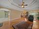Inviting living room with hardwood floors, tray ceiling, and an open layout at 514 Clover Leaf Rd, Marshville, NC 28103