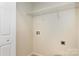 The laundry room features practical shelving and hookups at 5283 Fieldstone Dr, Concord, NC 28025