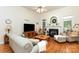 Spacious living room features hardwood floors, fireplace, and open layout for easy living and entertaining at 5283 Fieldstone Dr, Concord, NC 28025
