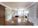 Spacious living room boasts hardwood floors, fireplace, and natural light at 539 Marsh Rd, Charlotte, NC 28209
