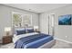 Comfortable bedroom with large window and cozy décor at 6135 Raisin Tree Ln, Charlotte, NC 28215