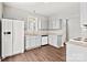 Well-equipped kitchen featuring granite countertops and modern white appliances at 6135 Raisin Tree Ln, Charlotte, NC 28215