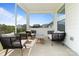 Inviting outdoor patio with comfortable seating, perfect for relaxing and enjoying the serene neighborhood views at 6145 Holland St, Fort Mill, SC 29707