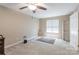 Serene bedroom featuring carpet, a window, and neutral walls at 6622 Cedar Cliff Dr, Charlotte, NC 28216