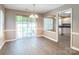 Inviting dining area with sliding glass doors and easy access to the adjacent kitchen at 6622 Cedar Cliff Dr, Charlotte, NC 28216