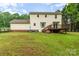 Home featuring a large backyard, wooden deck, and well-maintained lawn at 6769 Highway 557 None, Clover, SC 29710
