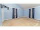 Spacious bedroom with vaulted ceilings, light-blue walls, and carpet flooring at 6769 Highway 557 None, Clover, SC 29710